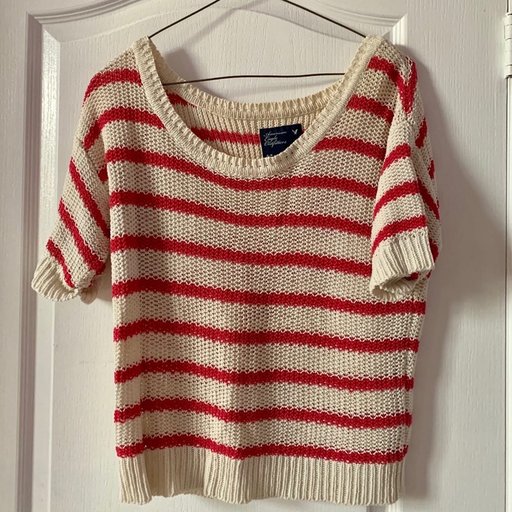 Knitted half sleeve stripped jumper.